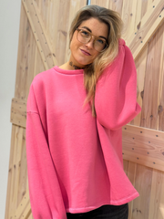 Pullover mit der Aufschrift „COPINE“